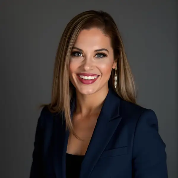 Professional headshot of team member Holly